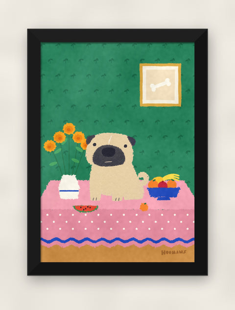 Pug at the Table art print in a black frame on a plain wall, front view