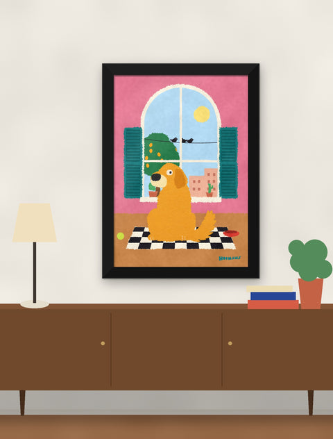 Black framed golden retriever poster hung above a walnut console with a lamp, books and a plant