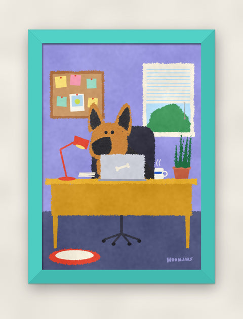 German Shepherd at the Desk art print in a teal frame on a plain wall