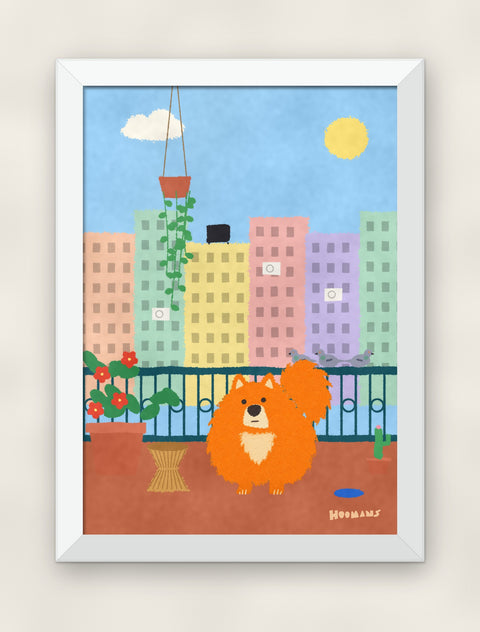 Pomeranian on the Balcony art print in a white frame on a plain wall