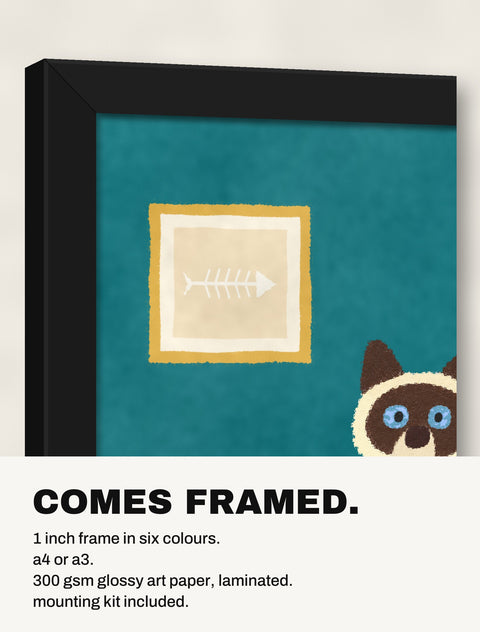 Corner of the black frame at an angle showing the Siamese by the Fishbowl print inside