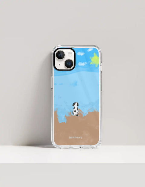 Hoomans Out of Office iPhone case — hand-painted spotted dog on a beach facing the sea, on iPhone 14 mockup