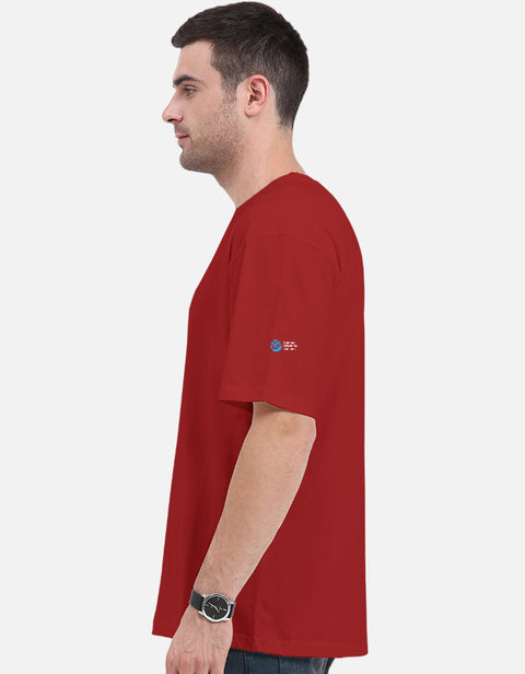 Indie Dogs oversized tee in red, side view with the Humane World for Animals India mark on the left sleeve