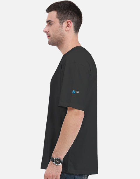 My Type? Desi oversized tee in black, side view with the Humane World for Animals India mark on the left sleeve