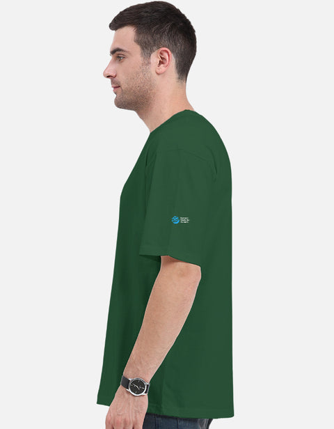 My Type? Desi oversized tee in bottle green, side view with the Humane World for Animals India mark on the left sleeve