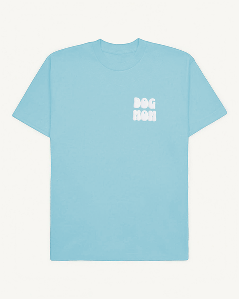 Baby blue oversized tee with 'Dog Mom' white puff print on left chest, front flat lay