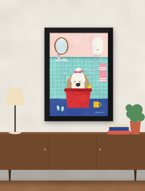 Black framed shih tzu poster hung above a walnut console with a lamp, books and a plant