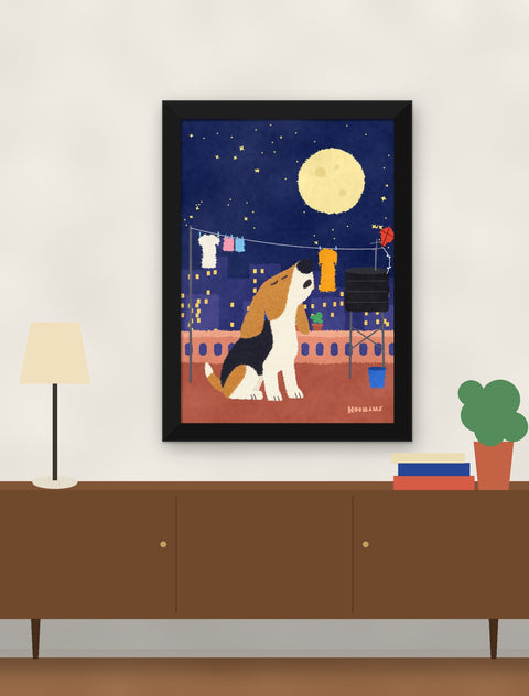Black framed beagle poster hung above a walnut console with a lamp, books and a plant