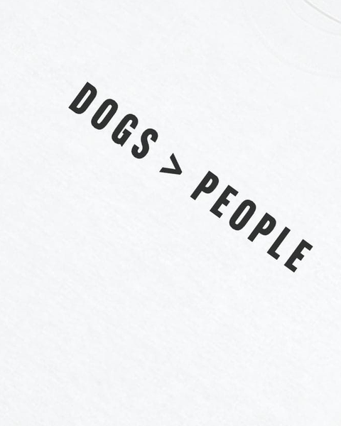 Dogs Greater Than People print close-up on white oversized tee – Hoomans India