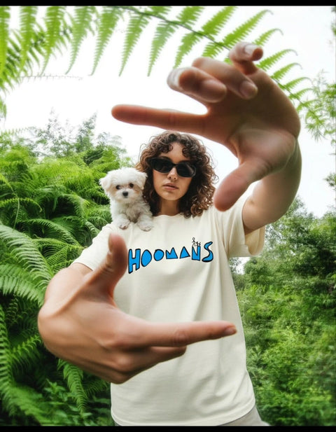 Real customer in the Easily Distracted By Dogs oversized tee holding a puppy, Hoomans India