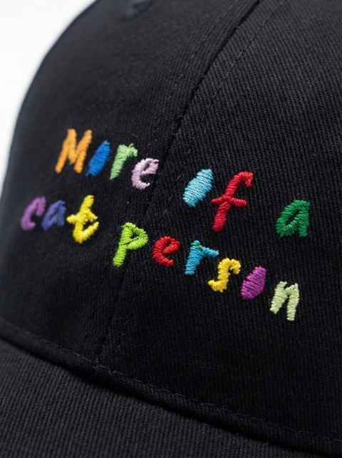 More of a Cat Person cap worn by model – Hoomans