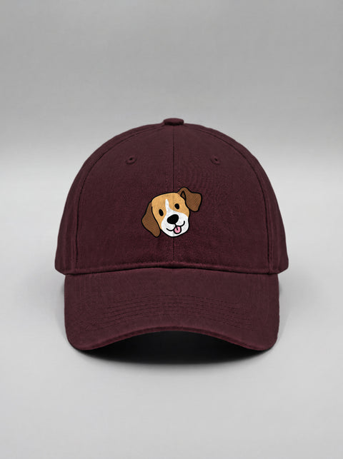Maroon baseball cap with embroidered beagle face, front view