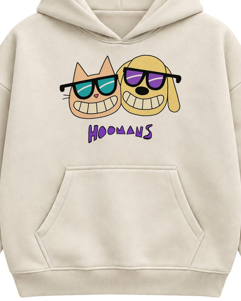 Close up of the Besties print on the cream boxy hoodie: the cat in turquoise sunglasses and the dog in purple sunglasses, cheek to cheek and grinning, with the purple HOOMANS wordmark