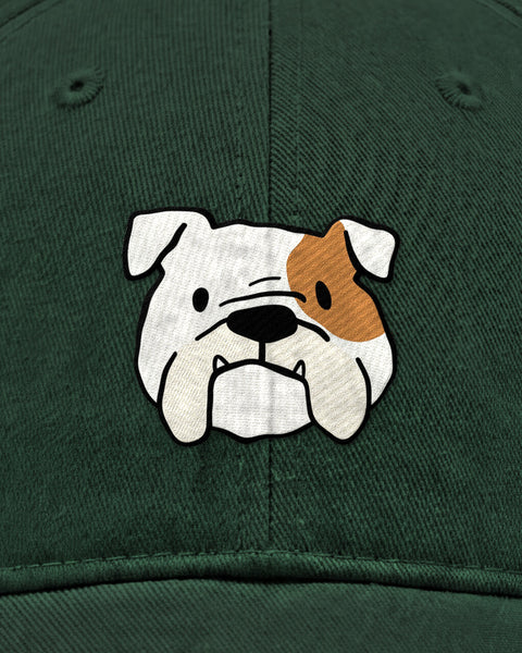 Embroidered english bulldog face in satin stitch on a bottle green baseball cap, close up