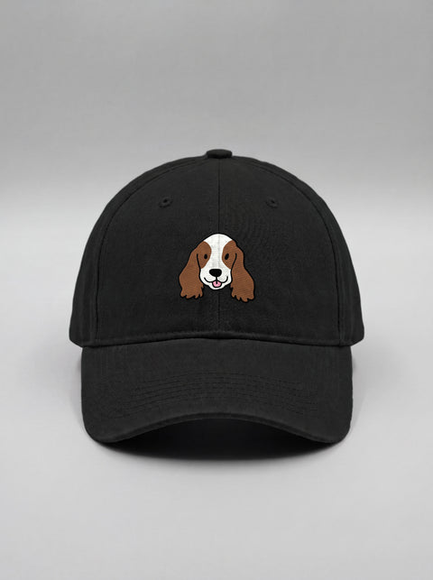 Black baseball cap with embroidered cocker spaniel face, front view