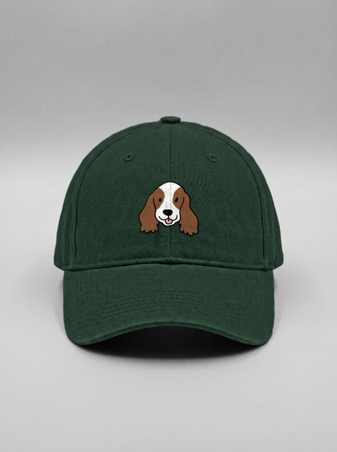 Bottle green baseball cap with embroidered cocker spaniel face, front view