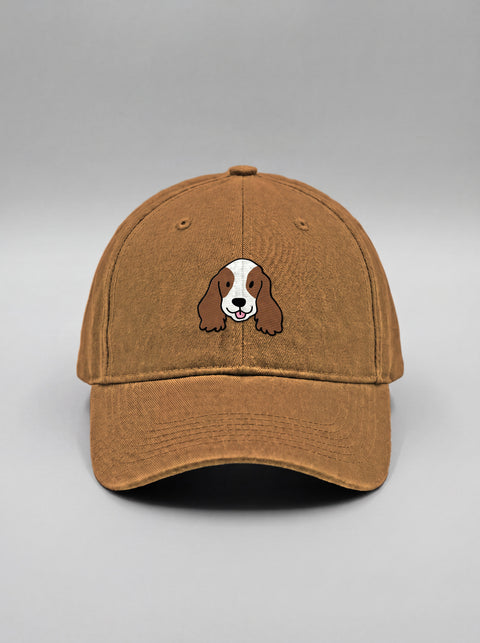 Khaki baseball cap with embroidered cocker spaniel face, front view