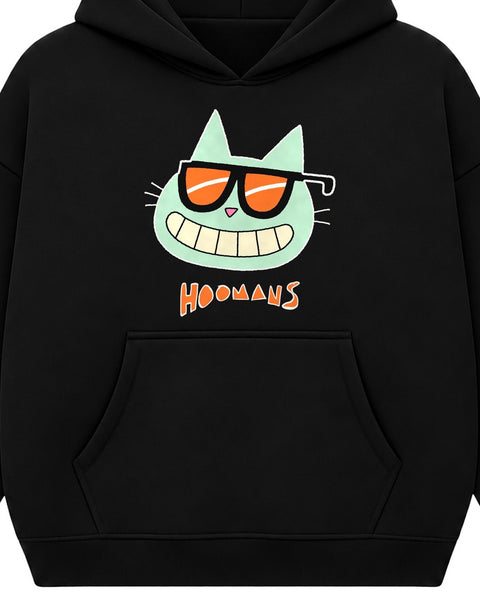 Close up of the Cool Cat print on the black boxy hoodie: the cat's black sunglasses with orange lenses, its wide toothy grin and the orange HOOMANS wordmark
