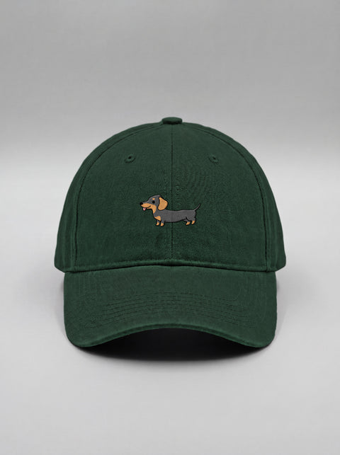 Bottle green baseball cap with embroidered full-body dachshund, front view