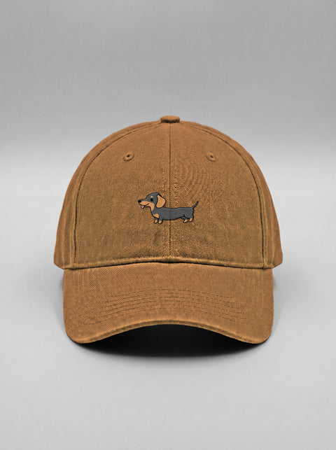 Khaki baseball cap with embroidered full-body dachshund, front view