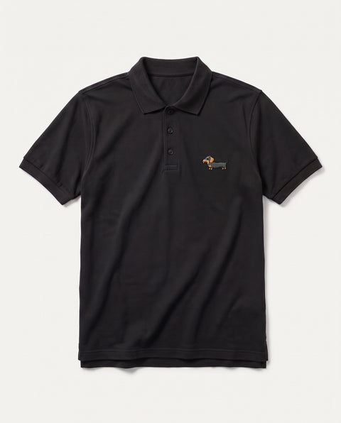 Black polo shirt with embroidered full-body Dachshund on the chest, front flat lay