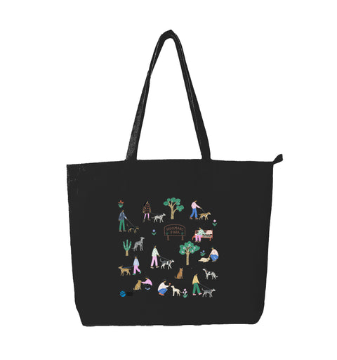 Dog Park large black cotton tote bag printed with an illustrated park of dogs, people and a HOOMANS PARK sign