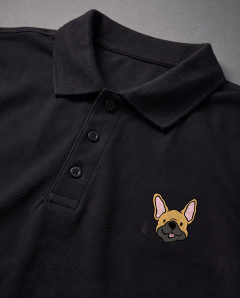 Black embroidered French Bulldog polo, close-up of collar, button placket, and satin-stitch chest patch