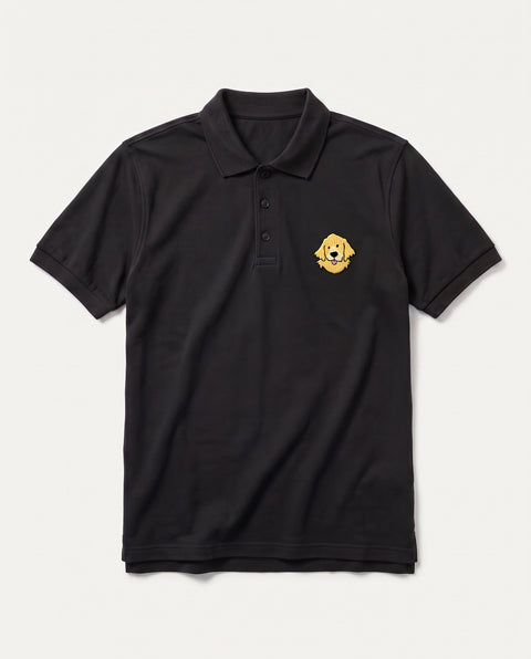 Black polo shirt with embroidered Golden Retriever face on the chest, front flat lay