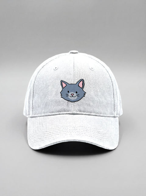 White baseball cap with embroidered grey cat face, front view
