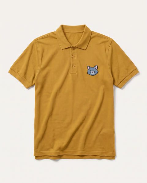 Mustard Yellow polo shirt with embroidered grey cat face on the chest, front flat lay