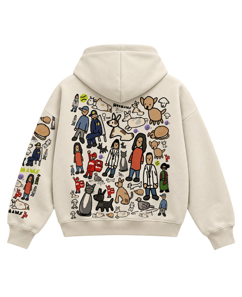 Back of the cream boxy hoodie covered in colony people, dogs, cats and HOOMANS wordmarks, flat lay