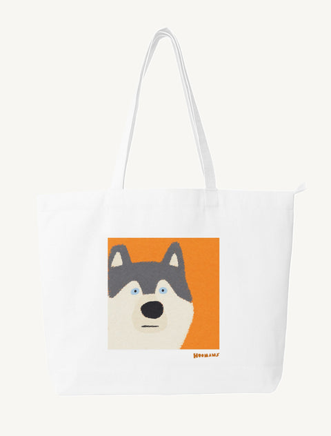 White large canvas tote bag with a flat colour Siberian Husky face on an orange block and an orange Hoomans wordmark, front view