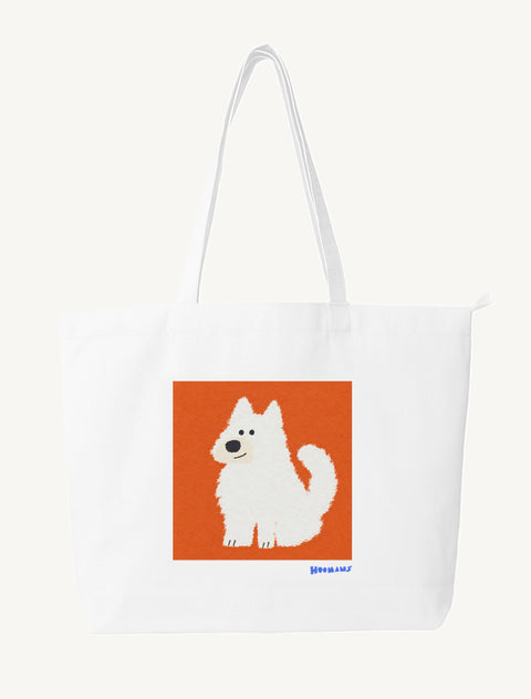 White large canvas tote bag with a flat colour white Indian Spitz sitting on a terracotta block and a royal blue Hoomans wordmark, front view