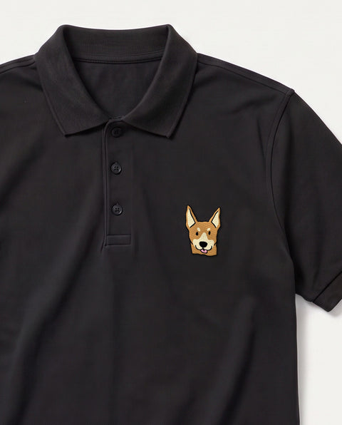 Black embroidered indie dog polo, close-up of collar, button placket and satin-stitch chest patch