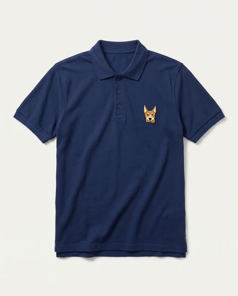 Navy blue polo shirt with embroidered Indian indie dog face on the chest, front flat lay