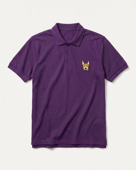 Purple polo shirt with embroidered Indian indie dog face on the chest, front flat lay