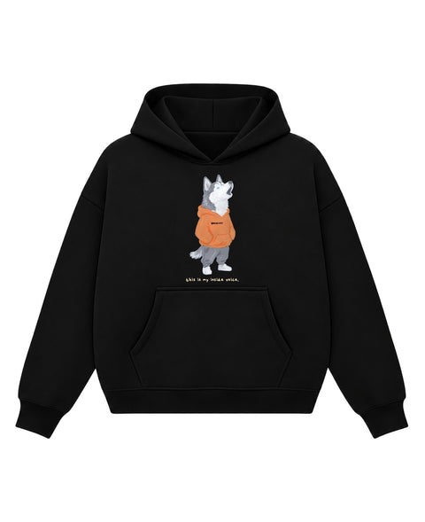 Black boxy hoodie with a painted siberian husky in an orange hoodie, mid-howl, above the line 'this is my inside voice.', front flat lay
