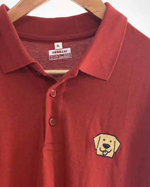 Collar and button placket of the Brick Red Lab Polo with the embroidered Labrador on the left chest