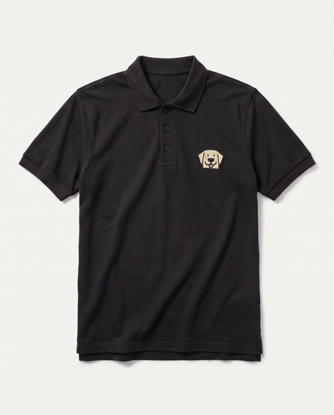 Black polo shirt with embroidered Labrador face on the chest, front flat lay