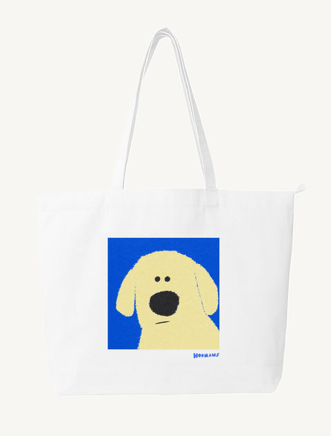 White large canvas tote bag with a flat colour Labrador face on a cobalt blue block and a blue Hoomans wordmark, front view