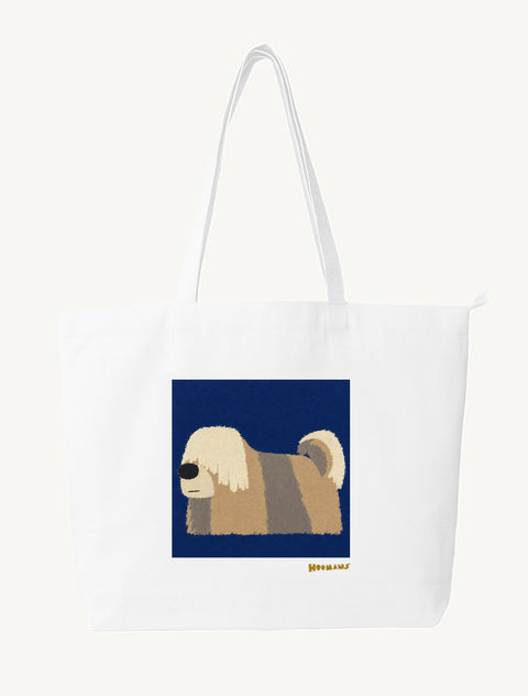 White large canvas tote bag with a flat colour Lhasa Apso in profile on a navy block and a gold Hoomans wordmark, front view