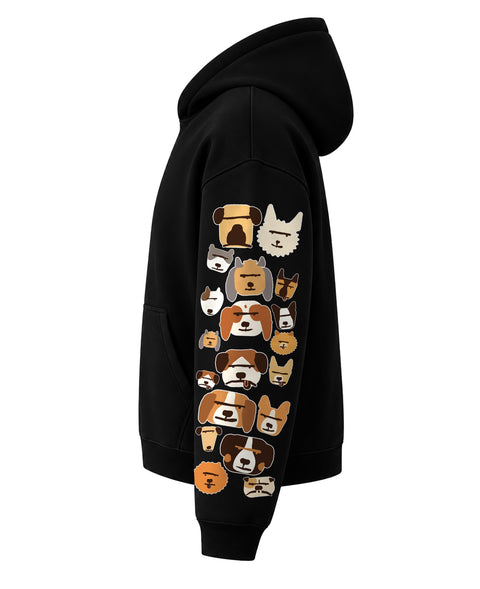 Left side of the black boxy hoodie with a column of dog breed faces running down the sleeve
