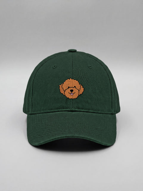 Bottle green baseball cap with embroidered poodle face, front view