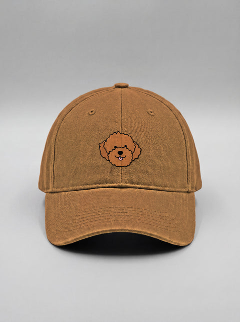Khaki baseball cap with embroidered poodle face, front view