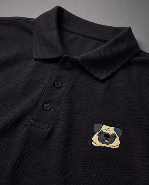 Black embroidered Pug polo, close-up of collar, button placket, and satin-stitch chest patch