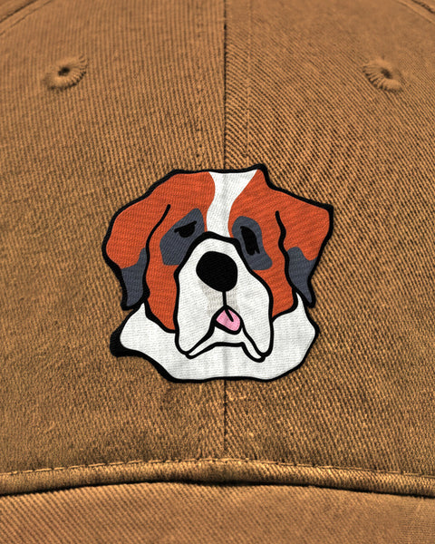 Embroidered saint bernard face in satin stitch on a khaki baseball cap, close up