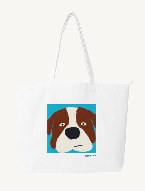 White large canvas tote bag with a flat colour Saint Bernard face on a turquoise block and a teal Hoomans wordmark, front view