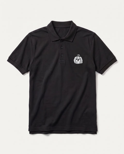 Black polo shirt with embroidered Shih Tzu face on the chest, front flat lay