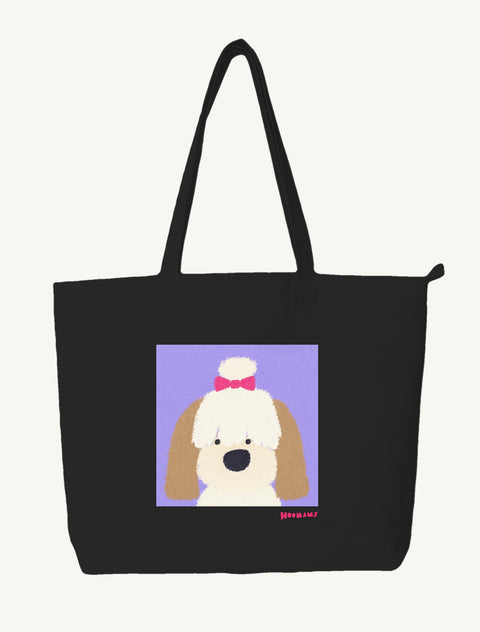 Black large canvas tote bag with a flat colour Shih Tzu with a pink bow on a lavender block and a raspberry Hoomans wordmark, front view