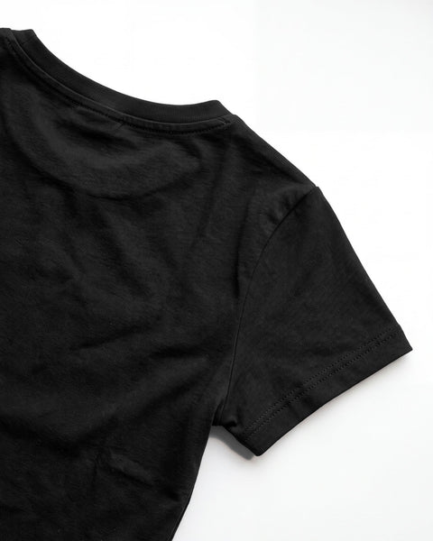 Back neckline and short sleeve hem of the black baby tee